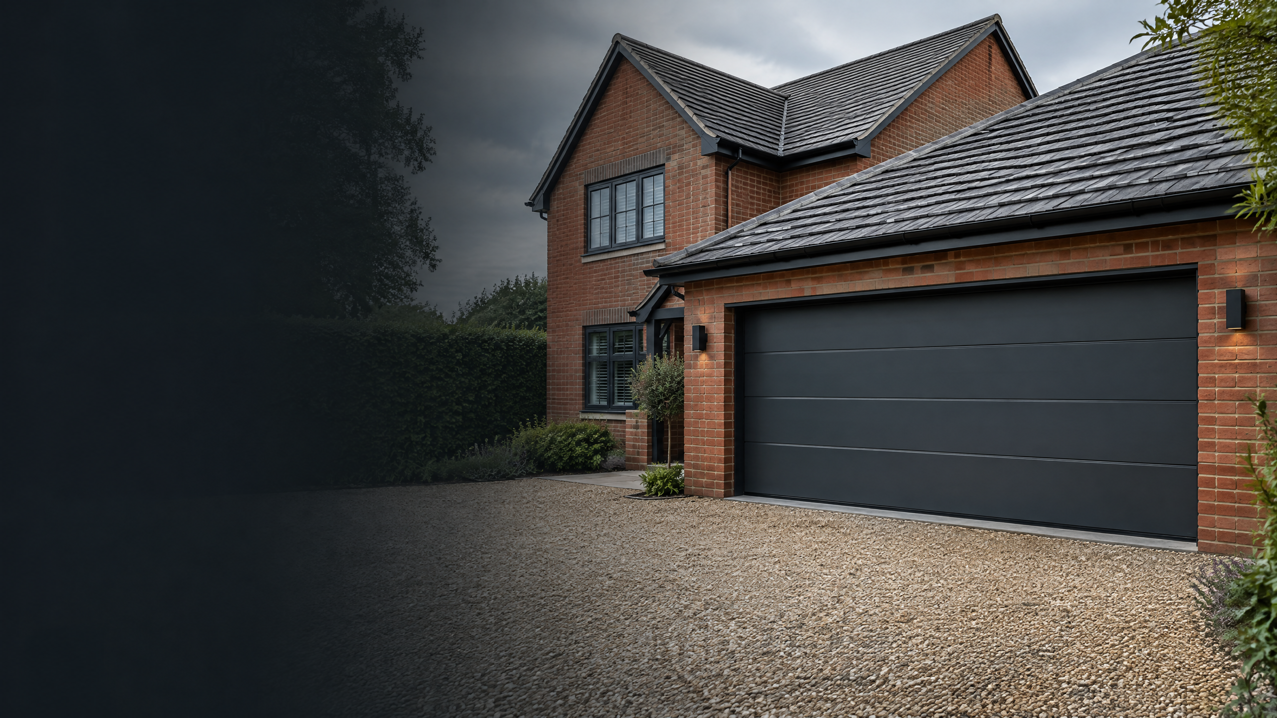 Three dark garage doors installed on a Norfolk outbuilding