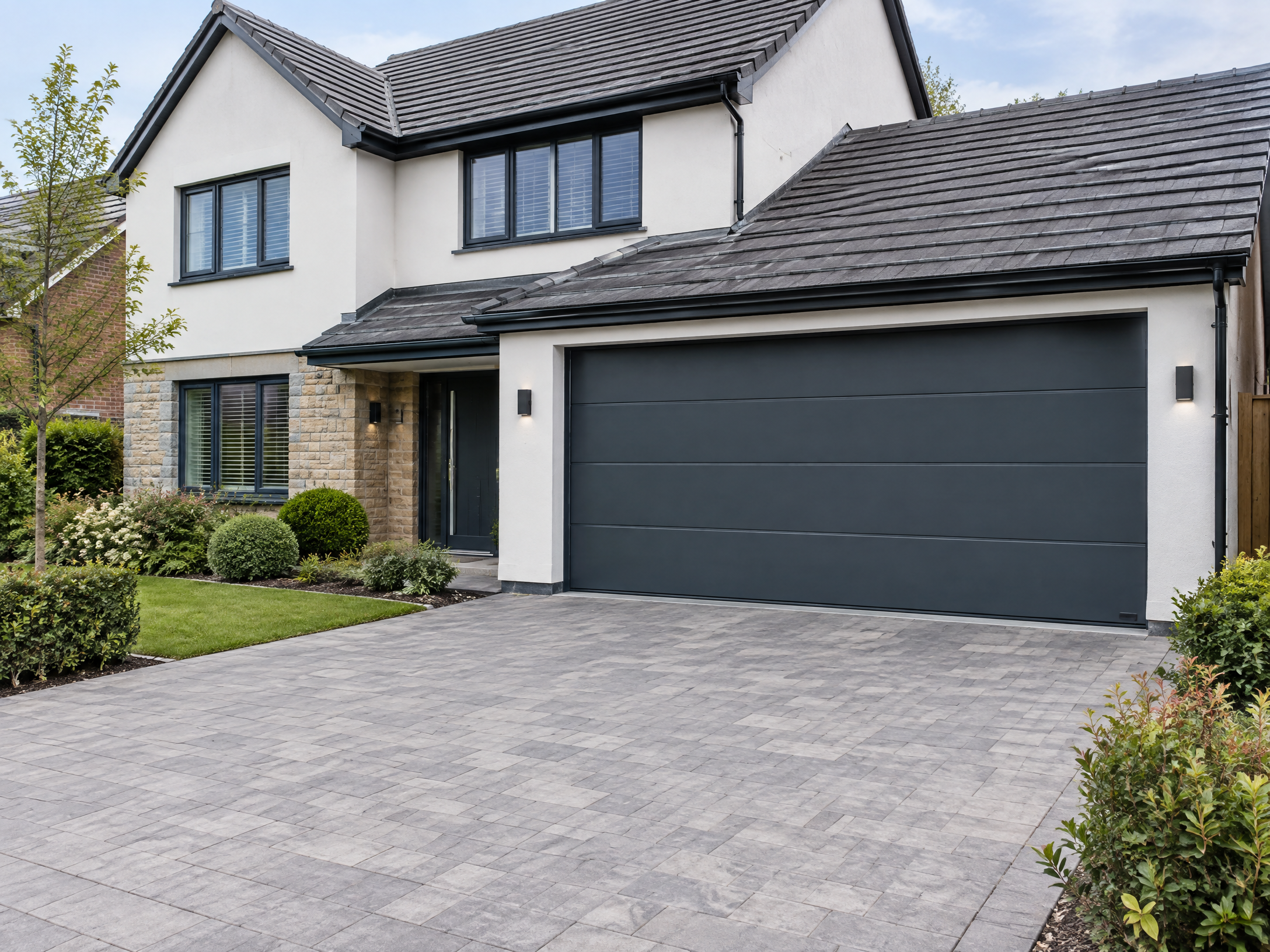Sectional garage door installed on a property