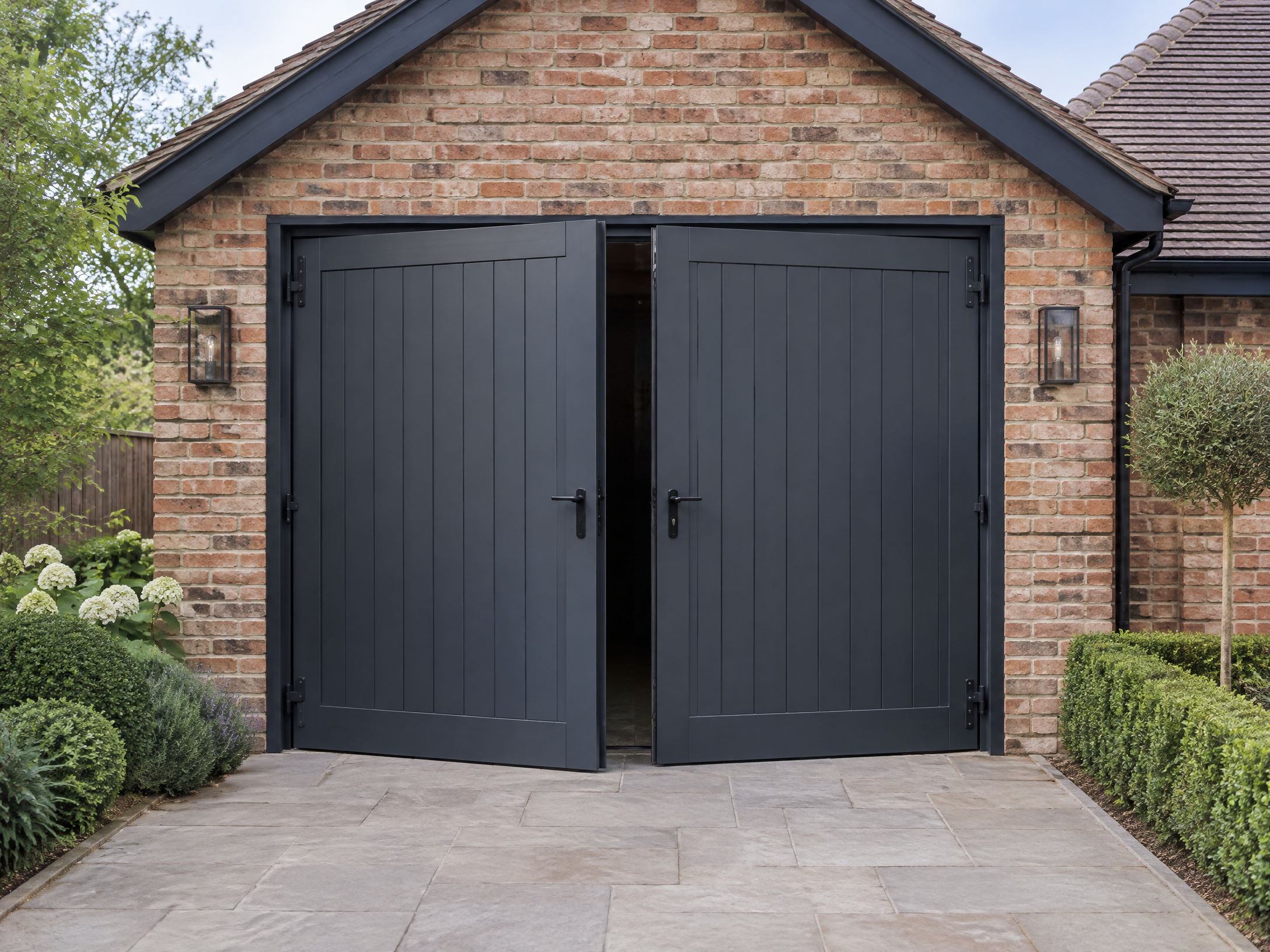 Side-hinged garage door installed on a property